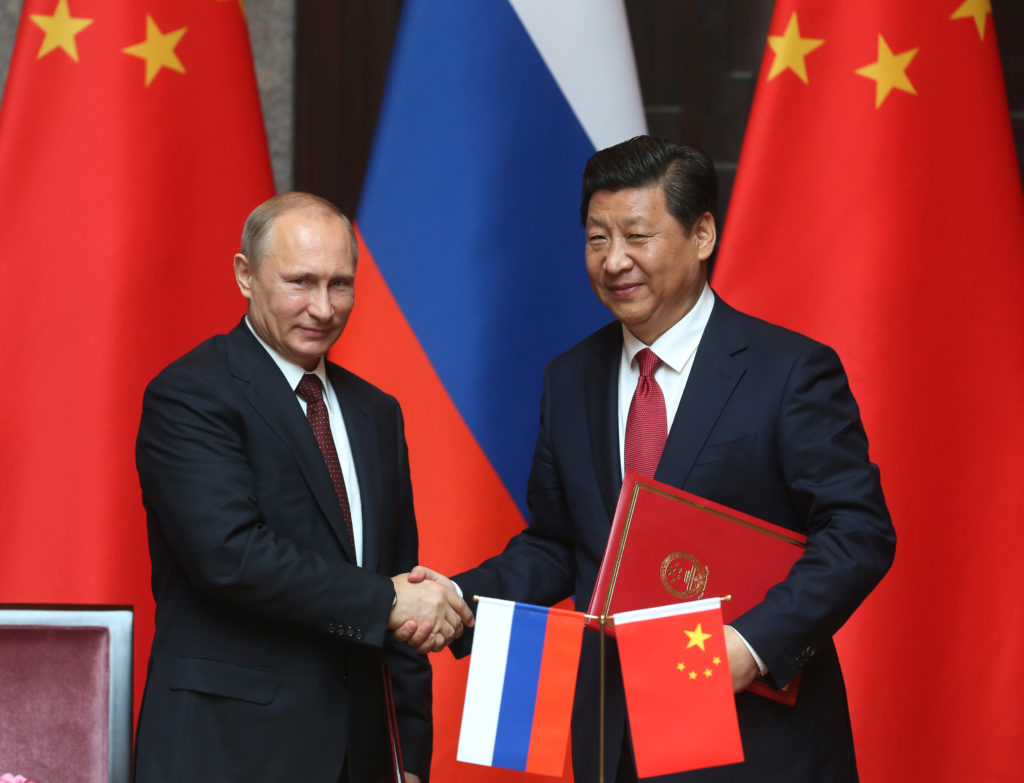 SHANGHAI, CHINA - MAY 20: Russian President Vladimir Putin (L) and Chinese President Xi Jing (Photo by Sasha Mordovets/Getty Images)