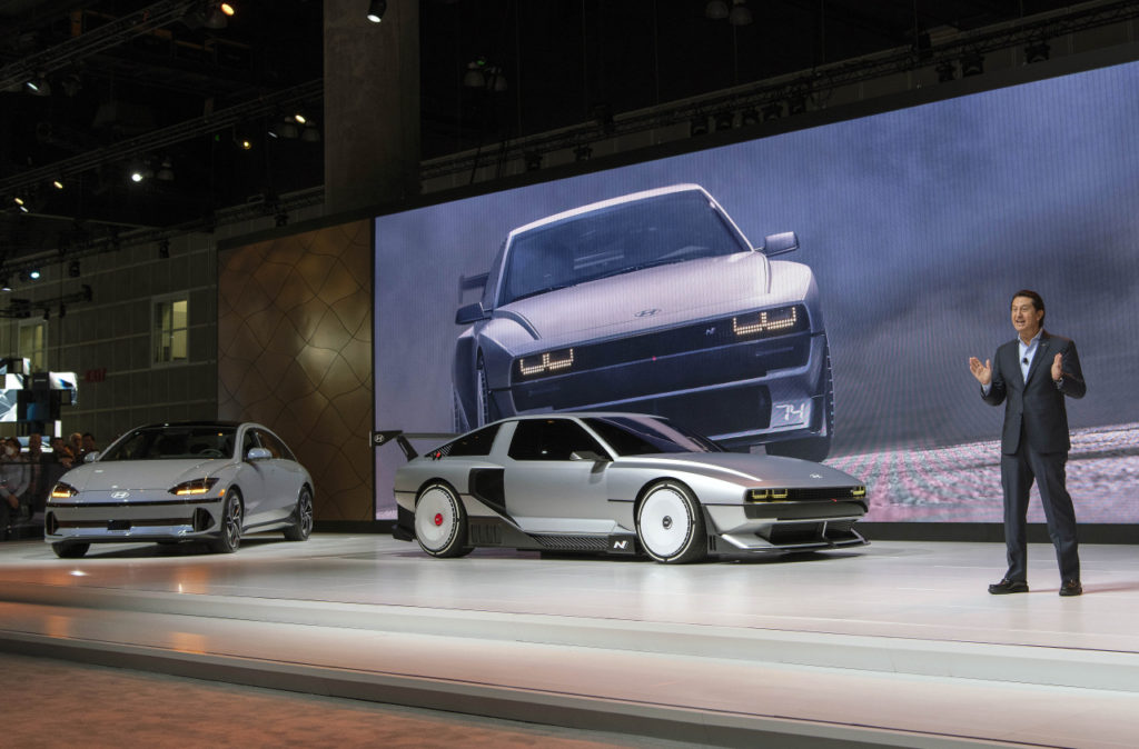 Hyundai Motor Global Chief Operating Officer Jose Munoz gives an explanation on the Ioniq 6 (far left) and N Vision 74 at the 2022 LA Auto Show on Thursday. (Hyundai Motor Group)