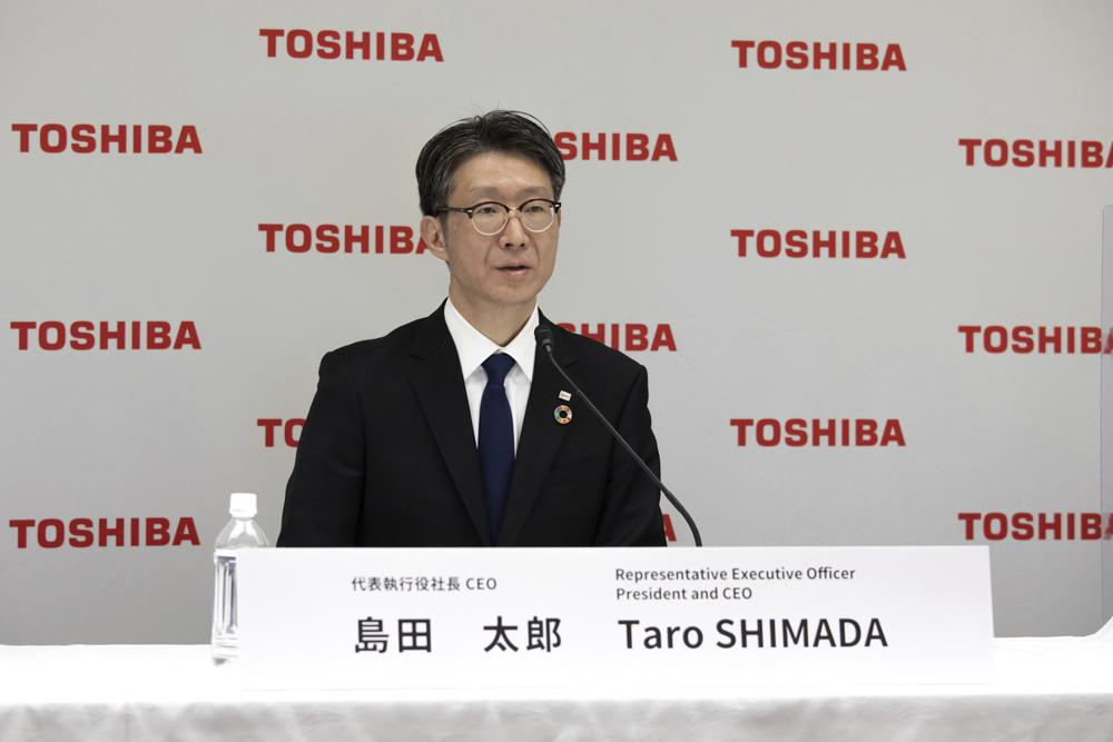 In this photo provided by Toshiba Corporation, new Toshiba Chief Executive Officer Taro Shimada speaks during an online press conference on March 1, 2022 in Tokyo. Toshiba’s Chief Executive Satoshi Tsunakawa is stepping down as the embattled Japanese technology giant seeks to restructure and restore its reputation. Tsunakawa will be replaced by Shimada, an executive officer and corporate senior vice president, under a decision made at a Toshiba board meeting Tuesday, March 1, 2022, the Tokyo-based company said.(Toshiba Corporation via AP)