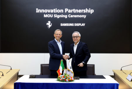 Samsung Display CEO Choi Joo-sun (right) and Ferrari CEO Benedetto Vigna shake hands after a memorandum of understanding signing ceremony held at the Korean firm's Asan Campus in Gyeonggi Province on Tuesday. (Samsung Display)