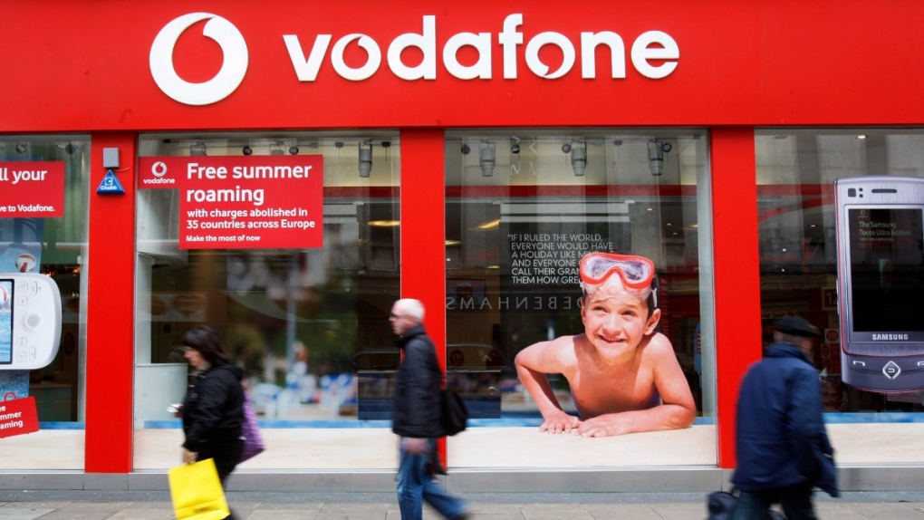 A branch of Vodafone in central London (Sang Tan / AP)