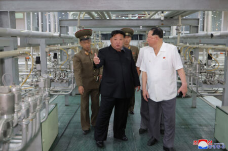 KCNA published five photos of Kim’s visit to the uranium enrichment facility, showing him inside two rooms. This image shows him on the raised platform with top nuclear weapons official Hong Sung Mu on the right. | Image: KCNA (Sept. 13, 2024)