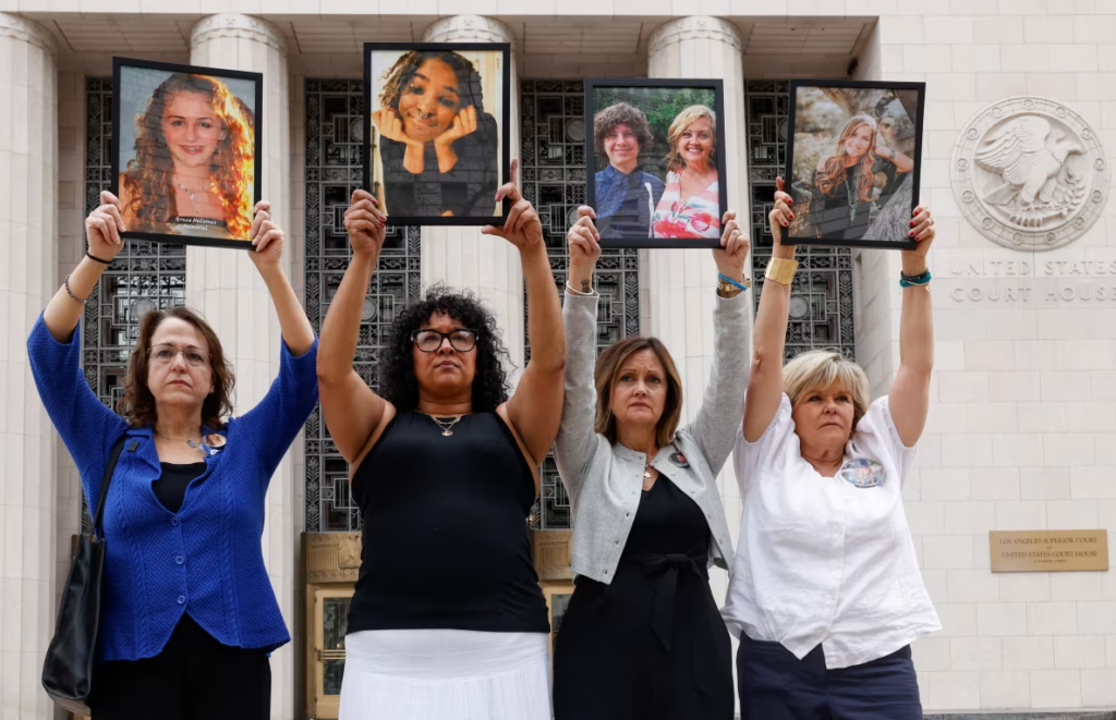 Parents who lost children to alleged social media–related harms hold a vigil ahead of a social media addiction trial in Los Angeles on February 5, 2026. Jill Connelly/Reuters